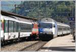 IR 2259 mit Re 460 020-1 kreuzt in Bellinzona den IR 2276.