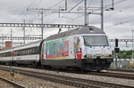Re 460 099-5, mit einer Mobiliar/Gottardo 2016 Werbung, durchfährt den Bahnhof Muttenz. Die Aufnahme stammt vom  30.05.2016.