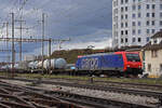 Re 474 016-3 durchfährt am 14.03.2023 den Bahnhof Pratteln.