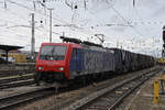 Re 474 014-8 durchfährt am 08.03.2023 den badischen Bahnhof.