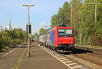 482 030-4  von der SBB-Cargo kommt mit einem Ewals-Cargo-Zug aus Köln-Eifeltor(D) nach Novara(I) und kommt aus Richtung Köln-Gremberg und fährt durch Bonn-Oberkassel in Richtung Koblenz. 
Aufgenommen vom Bahnsteig von Bonn-Oberkassel an der rechten Rheinstrecke. 
Bei Sommerwetter im Oktober am 6.10.2018. 