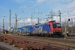 Re 482 012-2 durchfährt den badischen Bahnhof. Die Aufnahme stammt vom 28.01.2022.