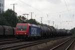 482 043-7 mit einem Kesselwagenzug in Kln West am 27.07.2010