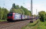 482 033 und eine unbekannte Re 4/4 der SBB Cargo zogen am 06.05.11 einen Containerzug durch Leipzig-Thekla Richtung Mockau.