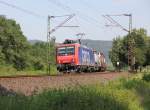 482 001 als Umleiter wegen der Baustelle auf der Main-Weser-Bahn mit dem  Bertschi -Zug in Fahrtrichtung Sden. Aufgenommen am 06.07.2011 vor Eschwege West.