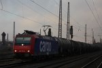 SBB Cargo 482 015 am 2.12.11 mit einem Keeselwagenzug bei der Durchfahrt durch Duisburg-Bissingheim.