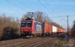 In den ersten frhlings Sonnenstrahlen des Jahres im Hamburger Raum hat 482 029-6 mit ihrem Containerzug erst einen kurzen Teil der langen Reise Richtung Sden hinter sich.