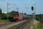 Re 482 032 von SBB Cargo zieht am 16.Juli 2013 einen Kesselzug durch Gundelsdorf Richtung Saalfeld.