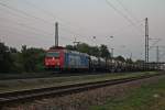 Am frhen Morgen des 11.07.2013 fuhr SBB Cargo Re 482 014-8 mit einem Kesselcontainerzug durch die Ortschaft Orschweier, die an der KBS 703 liegt, Richtung Offenburg.