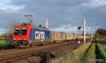 482 041-1 rollt kurze Zeit spter mit einem Holzzug vom Lbecker Konstinkai durch Reinfeld Richtung Hamburg. Aufgenommen am 24.11.13.