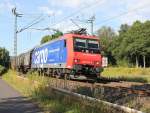 482 023-9 mit einem Teil des Novelis-Zuges in Richtung Göttingen unterwegs. Aufgenommen am 01.08.2013 bei Wehretal-Reichensachsen.