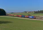 Re 482 022 mit einem Containerzug am 13.03.2014 bei Sinngrün. 