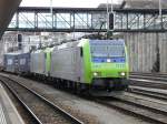 bls - Loks 485 014-9 und 486 507-7 mit Gterzug bei der einfahrt in den Bahnhof von Spiez am 25.02.2011