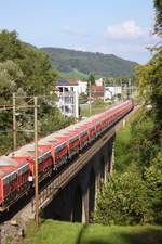 Am Montag, 21. August 2017 (18.15 Uhr)durchquert die SBB Re 620 047-8  Bex  mit einem vollbeladene Kies-Güterzug(leer) unter blauem Himmel, die 90 Meter lange Wildbachbrücke bei Rorbas, Richtung Winterthur. Der Güterzug hinterliess dabei auch eine Staubwolke.

(Nur zu Info: Die C 5/6 Nr. 2969 wird am 20. Okt. 2017 von Sulgen via Winterthur, [Hier durch die Wildbachbrücke bei Rorbas,] Bülach, Koblenz, Brugg nach Schwyz/Erstfeld fahren.)