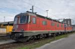 Re 6/6 11689 wartet am Güterbahnhof Muttenz auf den nächsten Einsatz. Die Aufnahme stammt vom 27.11.2014. 