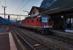 Re 6/6 11618  Dübendorf  fährt mit dem HUPAC-Zug 68197 (Basel Wolf - Chiasso) in den Bahnhof Erstfeld ein.
Ab hier bekam die Re 6/6 11618 Unterstützung durch die Re 4/4 II 11263.
Aufgenommen am 29.7.2016.