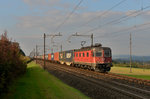 Re 6/6 11625 mit einem Containerzug am 30.09.2015 bei Sins.