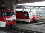 zb - Loks HGe 4/4 101 968-9 und HGe 4/4 101 966-0 und Te 2/2 171 201-7 und ABe 150 101-1 im Bahnhof Luzern am 11.06.2013