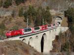 MGB - Die HGe 4-4 II 101 mit der GLACIER EXPRESS über der Grengiolsviadukt - 01-02-2016