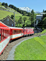 Unterwegs mit HGe 4/4 II 108  Channel Tunnel  der Matterhorn-Gotthard-Bahn (MGB) zwischen Andermatt (CH) und dem Nätschen.