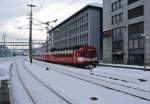 Advents Extrazug fr den Reisedienst Walkringen: BLS RBDe 566 I, Triebwagen 220, B 558-9 und ABt 920-1 bei Durchfaht in Olten, 09.12.2012.