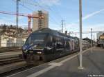 Re 460 019-3 ''Verkehrshaus III'' am 28.11.2011 in St.Gallen als IC 728 nach Genf.