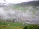 Bahnhofsgelnde von Andermatt aus Richtung Ntschen durch die Wolken gesehen. 07.08.07 