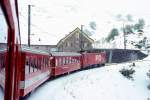 MGB FO-Glacier-Express 900 von Brig nach Disentis/Chur am 06.06.1995 Ausfahrt Andermatt mit FO-Zahnrad-E-Lok HGe 4/4II 107 - RhB B 2422 - B 4272 - Bt 4291 - Bt 4292 - AS 4030. Hinweis: BVZ/FO-Fahrzeuge noch alte Lackierung, Glacier-Express fr Gruppenreisen nach Disentis/Chur, wegen Wintereinbruch alle Gruppenanmeldungen storniert!
