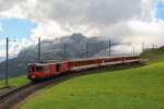 Deh 4/4 der MGB mit einem Personenzug am 19.08.2014 am Oberalppass.