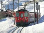Deh 4/4 55 verlst als R856 Ntschen als Entlastungssportzug Richtung Oberalppass. (10.01.2009)
