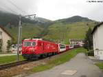 HGe 4/4'' 104 ''Furka'' mit dem GEX 911 Davos - Zermatt, der wegen der Entgleisung eines GlacierExpress mitte Juli einen RhB 1. Klasswagen und ein Gourmino-Speisewagen, anstatt den normalen GEX-Wagen mitfhrt, am 6.8.2010 bei der Einfahrt in Andermatt. Mit diesem Bild schliesse ich die Bilderserie meiner Sommerferien ab, ich hoffe euch gefielen diese Bilder.