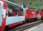 HGe 4/4 II Nr.4 verlsst am verlsst am 11.08.10 mit D 906 den Bahnhof Andermatt in Richtung Oberalppass.
