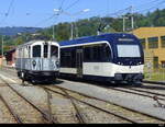tpc-AOMC / MVR / BC - Oldtimer Triebwagen BCFe 4/4  6 bei Rangierfahrt im Bahnhof von Blonay neben ABeh 2/6 7505 am 10.09.2023