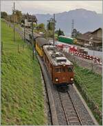  La DER de la Saison 2023  - Die Bernina Bahn RhB Ge 4/4 81 der Blonay-Chamby Bahn mit dem  Velours -Express von Chaulin nach Vevey bei Cornaux unmittelbar vor der Einfahrt in den  Baye de Clarens Schlucht  Tunnel. 

29. Okt. 2023