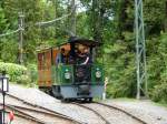 BC - Kastendampflok Nr.4 unterwegs im Depotareal von Chaulin mit dem Personenwagen der AL C 21 am 30.05.2009