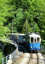 BC Museumsbahn EXTRAZUG 2825 von Vevey nach Weiche -(Chaulin) am 19.05.1997 auf Baye le Clarens - Viadukt mit Triebwagen exTL Ce 2/3 28 - exAL K 87 - exLCD C 21.