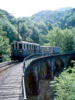 BC Museumsbahn-Extrazug 6020 von Chaulin Weiche nach Blonay am 19.05.1997 auf Baye de Clarens-Viadukt mit Triebwagen exMCM BCFeh 4/4 6 - exLCD C 21 - exAL K 87.
