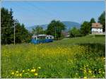 - Pfingstdampf Festival bei der Museumsbahn Blonay-Chamby - Die historische Tram Ce 2/3 N 28 aus Lausanne hat am 27.05.2012 die Steigung zum Dpot Chaulin fast geschafft.