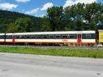 trn - Personenwagen 2 Kl. B 50 35 20-34 307-3 hinter dem Depot in Fleurier am 01.08.2011