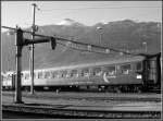 Ein Bcm Couchette Wagen vor der Kulisse des Calanda in Chur.