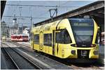 S7 23744 mit GTW 707-5 nach Weinfelden und S 25 5018 mit BDhe 3/6 25 nach Rorschach Hafen in Rorschach. (04.09.2018)