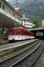 BDhe 4/4 21 wartet im Bahnhof Vitznau auf seinen Abfahrt am 3.August.2011. Wegen des slechten Wetter ist der Zug nur mig besetzt.