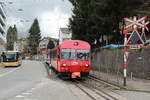 In Riethüsli schiebt BDeh 4/4 14 am 16.03.2018 ihren Zug hinunter nach St. Gallen, an der Spitze der Steuerwagen Bt 115