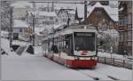 Be 4/8 32 erreicht Trogen. Die Zugzielanzeige ist bereits fr die Rckfahrt nach St.Gallen umgestellt. (17.01.2013)