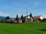 asm BTI - Dienstextragterzug mit dem Be 4/4 101 und 3 Kieswagen Typ Fa unterwegs in Tuffelen am 17.08.2009