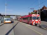 asm Oberaargau - Triebwagen Be 4/4 14 mit Steuerwagen Bt 112 (ex FW) neben BSU Bus im Bahnhof Solothurn am 14.08.2014