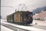 Die alten Lokomotiven der Berner Oberland Bahn - Lok 21: Unmittelbar vor der Ausmusterung, Grindelwald, Dezember 1964. Gut sichtbar ist die noch benutzte Dachrute für die Dachrutenkupplung (Licht und Heizung). 