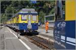 Der BOB Zug 250 von Grindelwald wartet in Zweilütschienen auf den Zug 150 von Lauterbrunnen um dann gemeinsam nach Interlaken weiter zu fahren.
