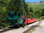 Die Bergfahrende Dampflok 14 der Brienz Rothorn Bahn bei der Aufenthalt in Bahnhof Planalp.
05.07.2019.
