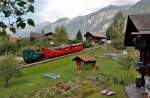 BRB-Dampfzug 2. Generation mit Lok 6 und den Personenvorstellwagen B16 und B26 (alle Baujahr 1933) fahren nach der aufwendigen R3 wieder - hier bei Bergfahrt kurz nach der Abfahrt in Brienz. Vielleicht gibts ein 80 Jahre-Jubiläum. Aufnahme vom 04. August 2013, 10:50